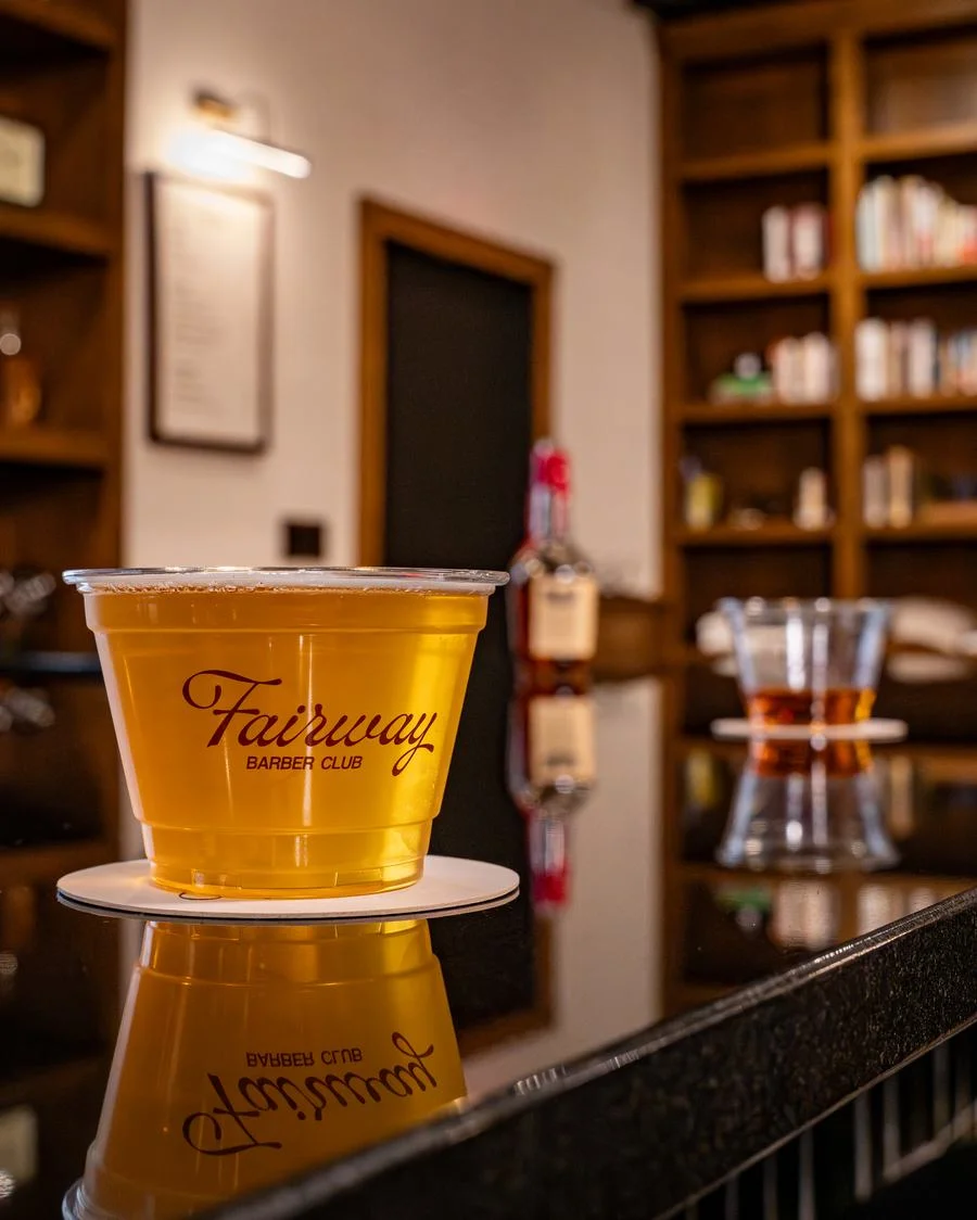 Fairway cup on the bar with the menu framed behind
